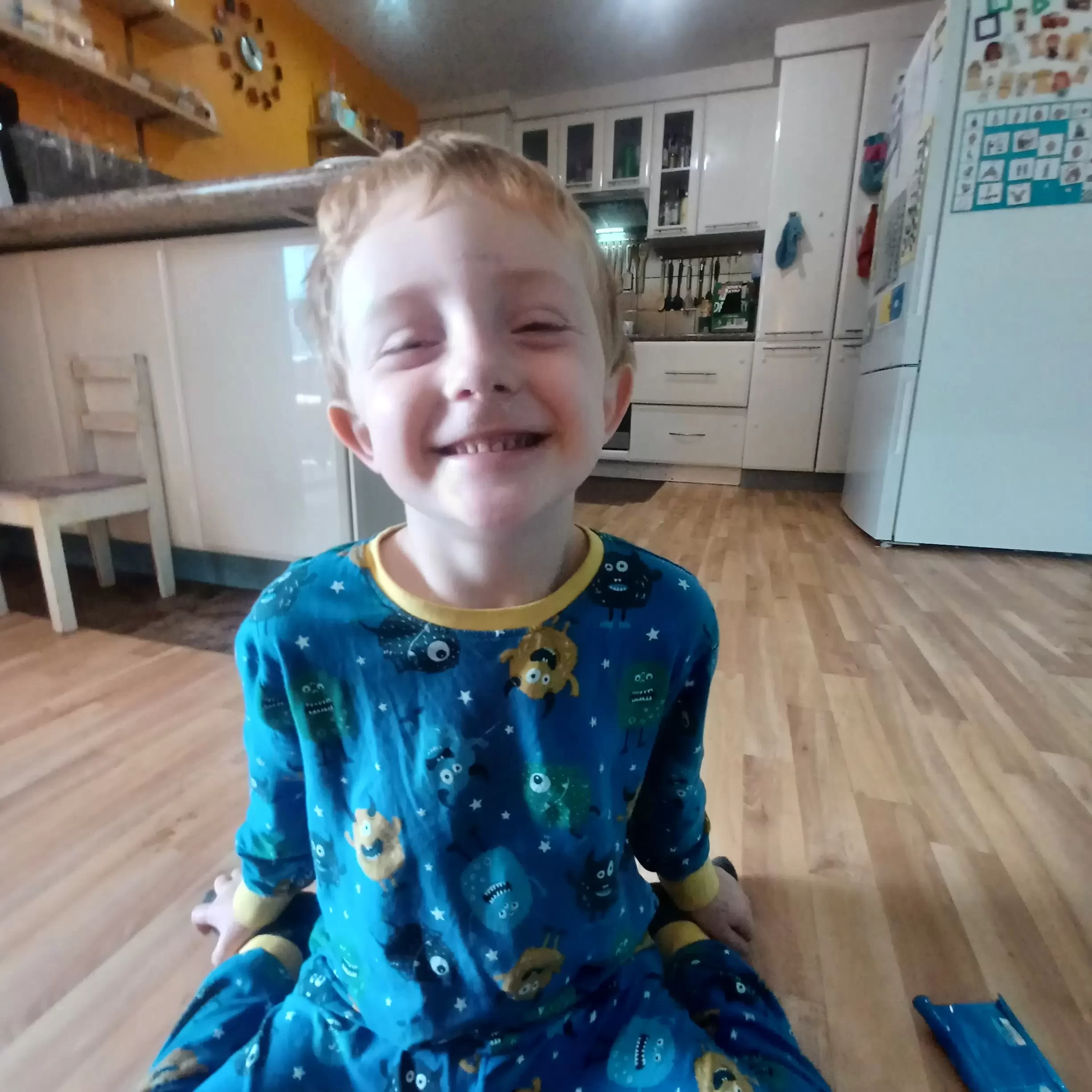 Grant Recipient Arlo Happy in his home